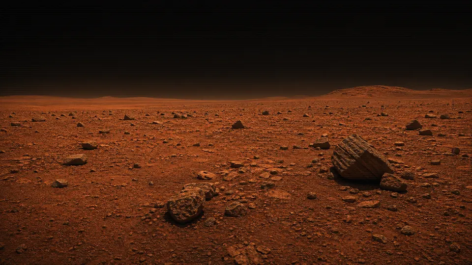 Right hazard-camera view of orange Martian terrain with scattered rocks and a low horizon.
